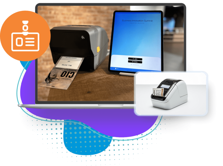A badge printer and tablet at a registration desk